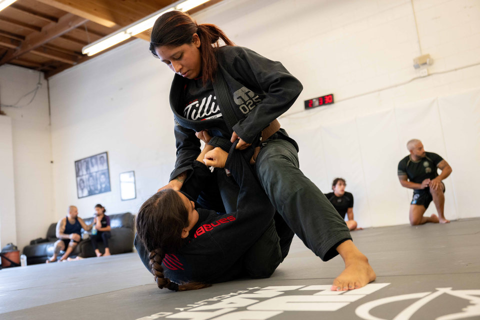 Tillis students practicing Brazilian Jiu Jitsu on the mats
