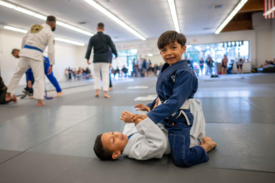 Young Tillis students at a belt promotion ceremony