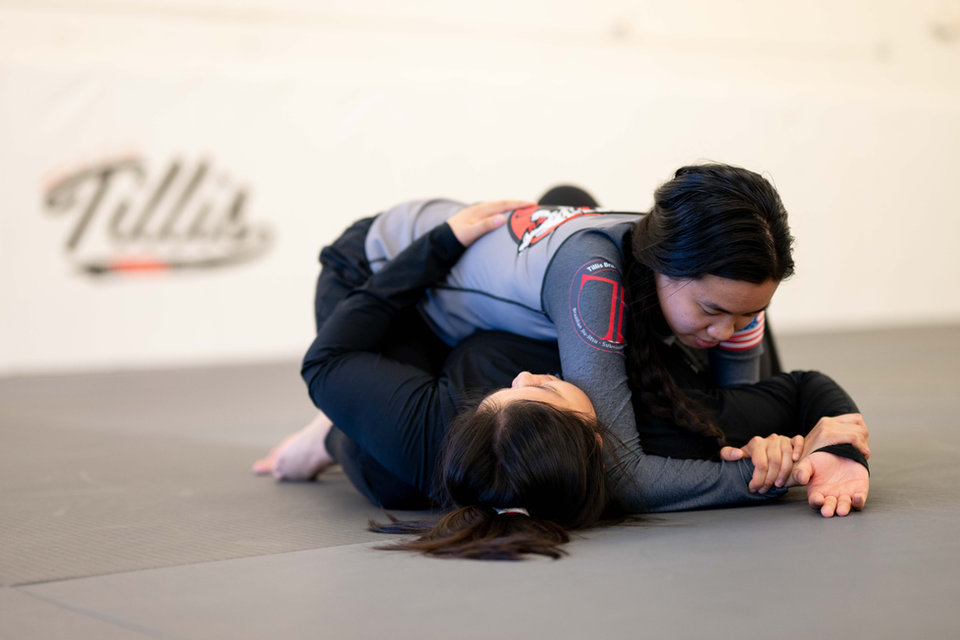 Women training together at Tillis